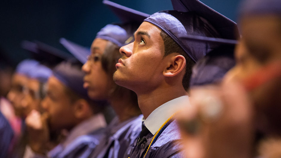 A group of New York high school students at graduation