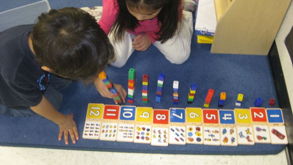 Young Children Playing a Math Game